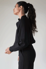 Woman in cute black comfortable outfit