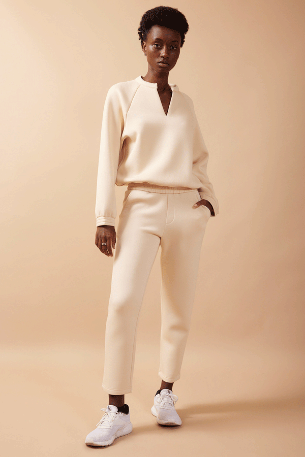 comfy cream work pants and sweater
